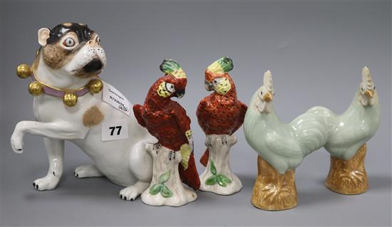 A Meissen style model of a pug and a pair of Chinese porcelain cockerels and a pair of porcelain parrots tallest 19.5cm